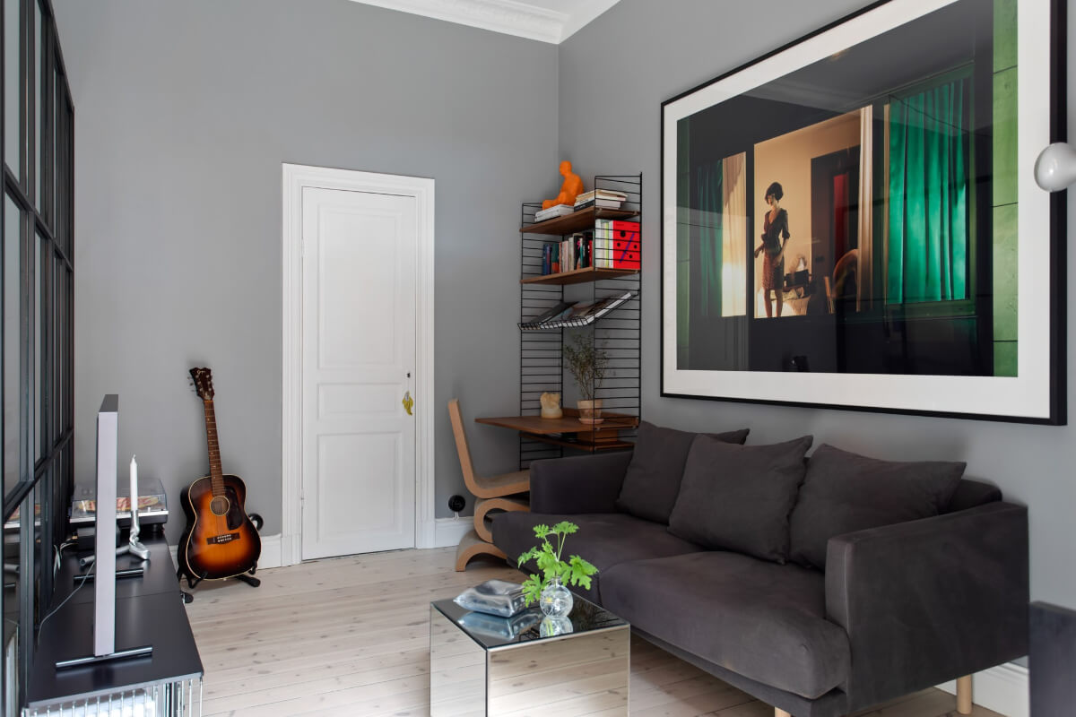 A Gray Studio Apartment with an Industrial Room Divider 6 gray sitting area mirror cube coffee table