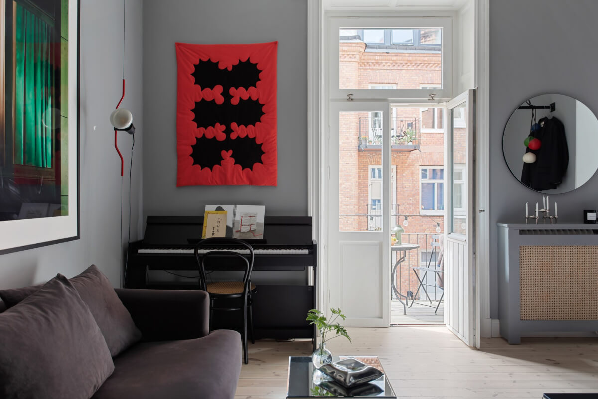 A Gray Studio Apartment with an Industrial Room Divider 3 gray studio sitting area