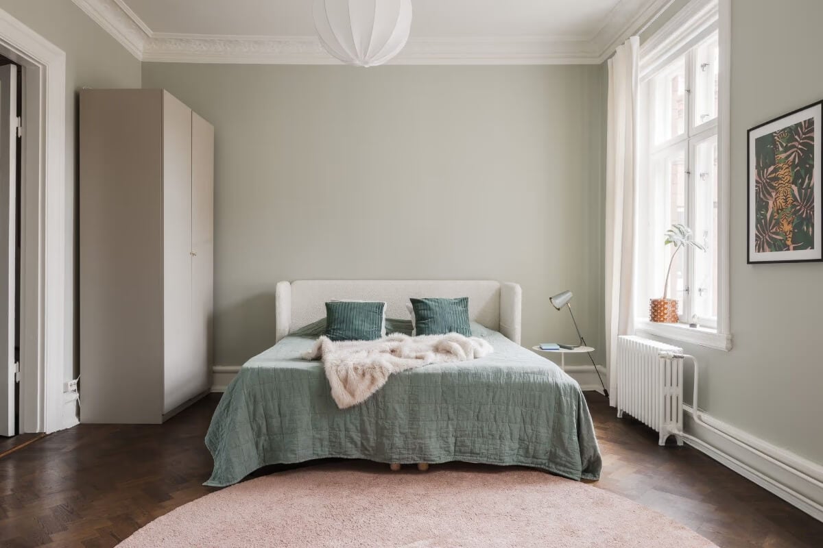 Grand Rooms and Period Features in a Malmö Apartment 20 green bedroom