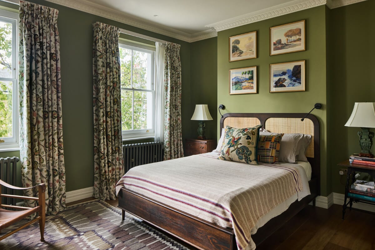 A Renovated Early Victorian Townhouse Decorated in Green Tones 13 green bedroom floral curtains