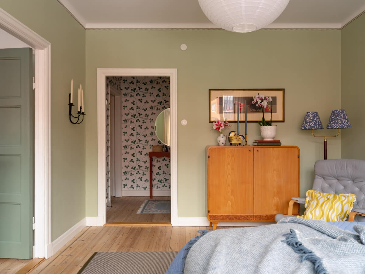A Beautiful Well-Preserved 1930s Apartment with a Blue Kitchen 18 green bedroom vintage cabinet