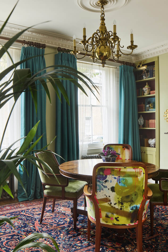 A Renovated Early Victorian Townhouse Decorated in Green Tones 8 green dining room large rug