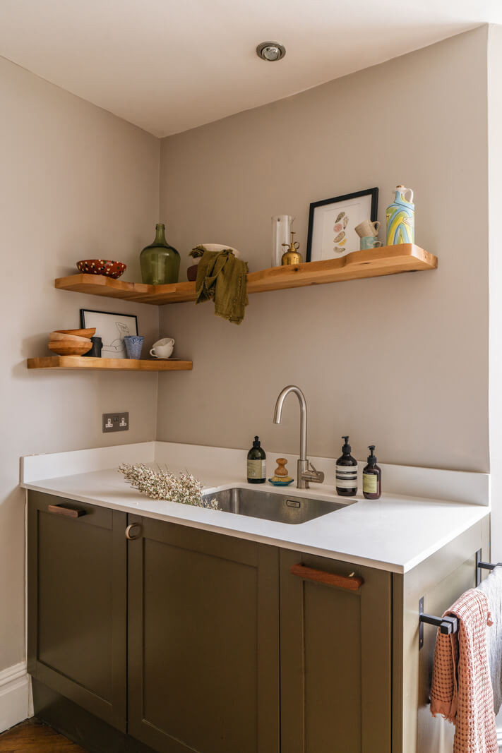 A Charming Garden Apartment in a Victorian House 8 green kitchen cabinets