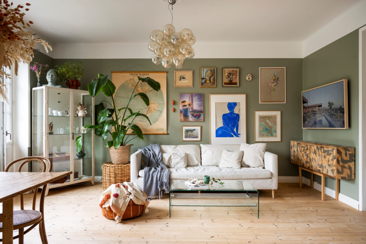 A Light Swedish Apartment with a Green Living Room 2 green living room gallery wall