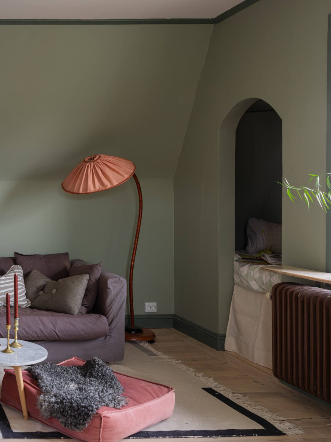 A 1920s Villa Pairs Modern Design and Period Features 21 green living room with niche