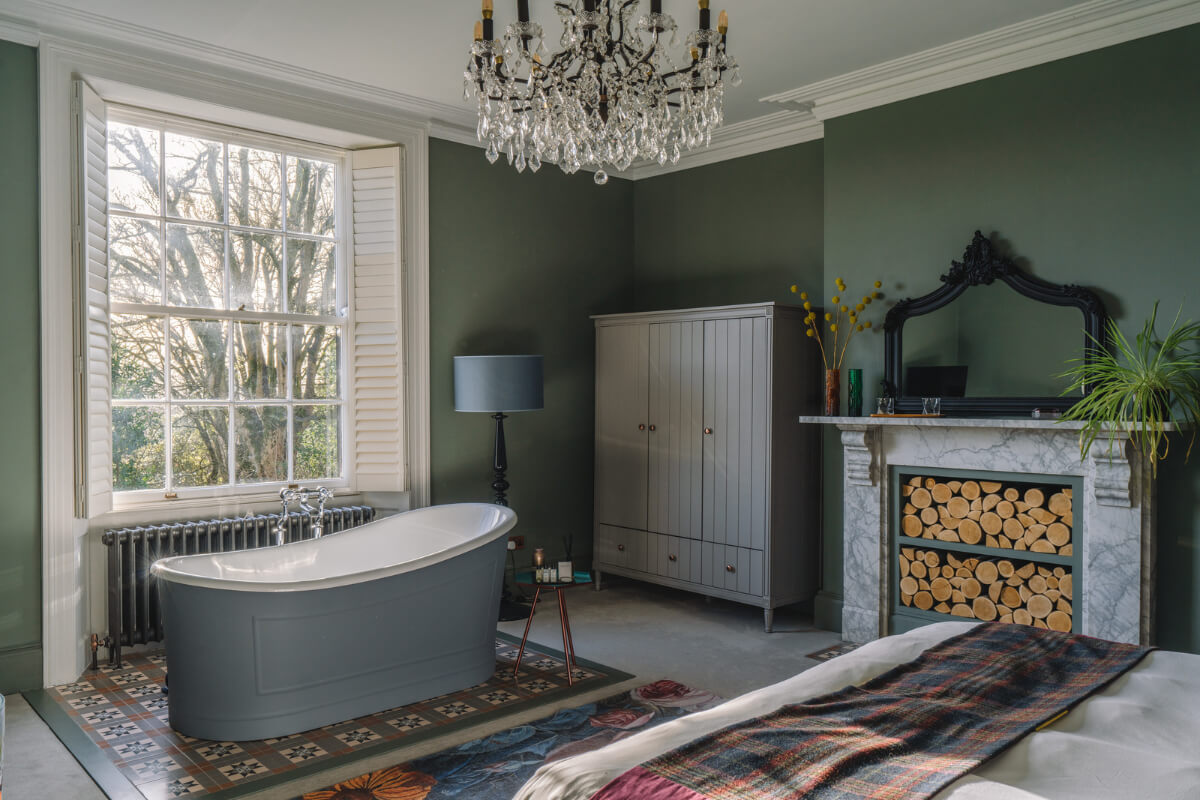 Colorful Rooms in a Regency Manor House in Yorkshire 10 green master bedroom with freestanding bath