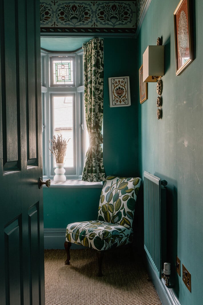 Moroccan-Inspired Designs in a Unique Artist Family Home in London 29 green nursery armchiar