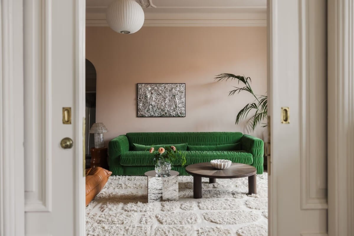 Grand Rooms and Period Features in a Malmö Apartment 6 green sofa