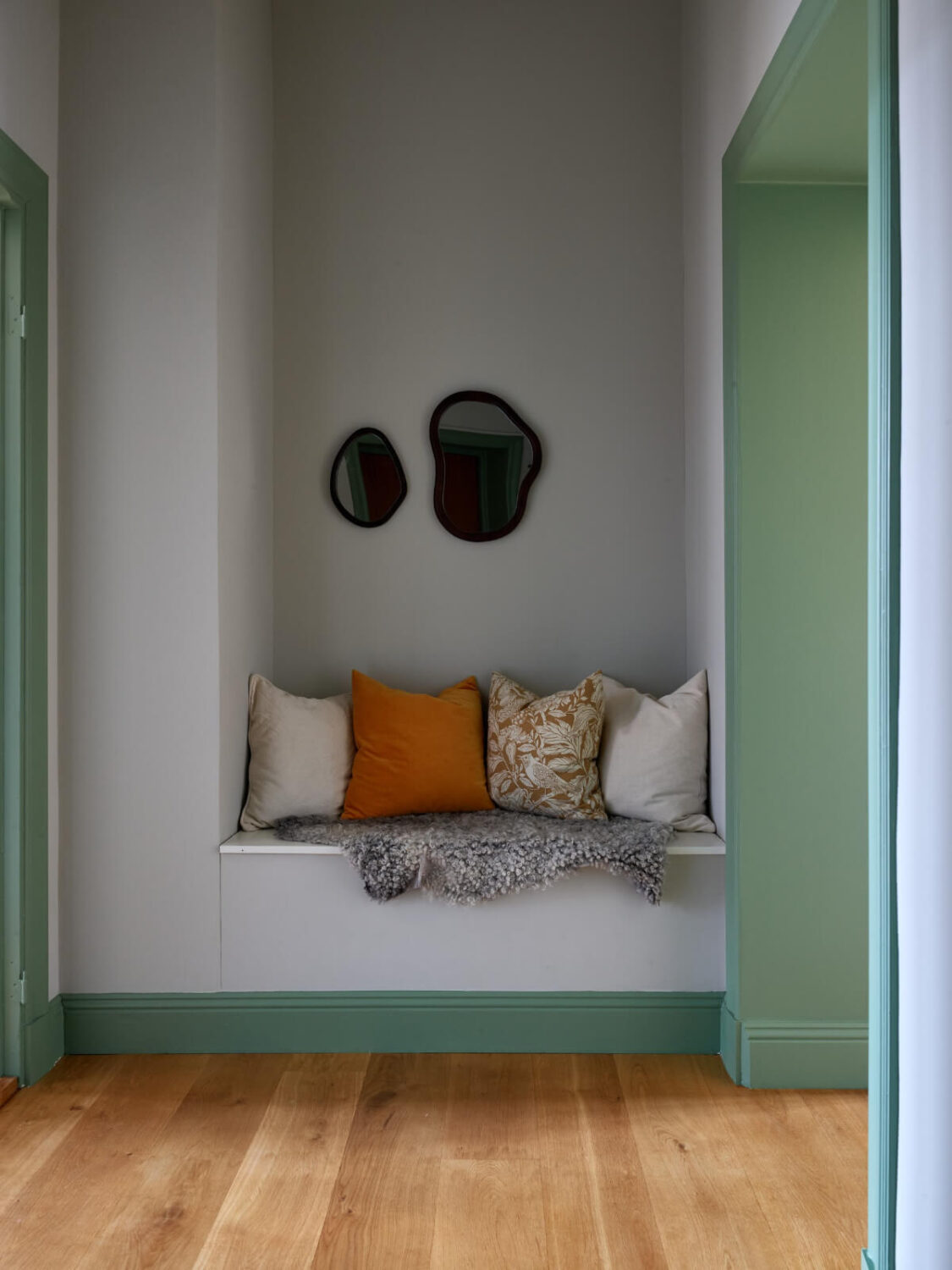 Lovely Color Combinations in a Charming One-Bedroom Apartment 8 hall bench green joinery