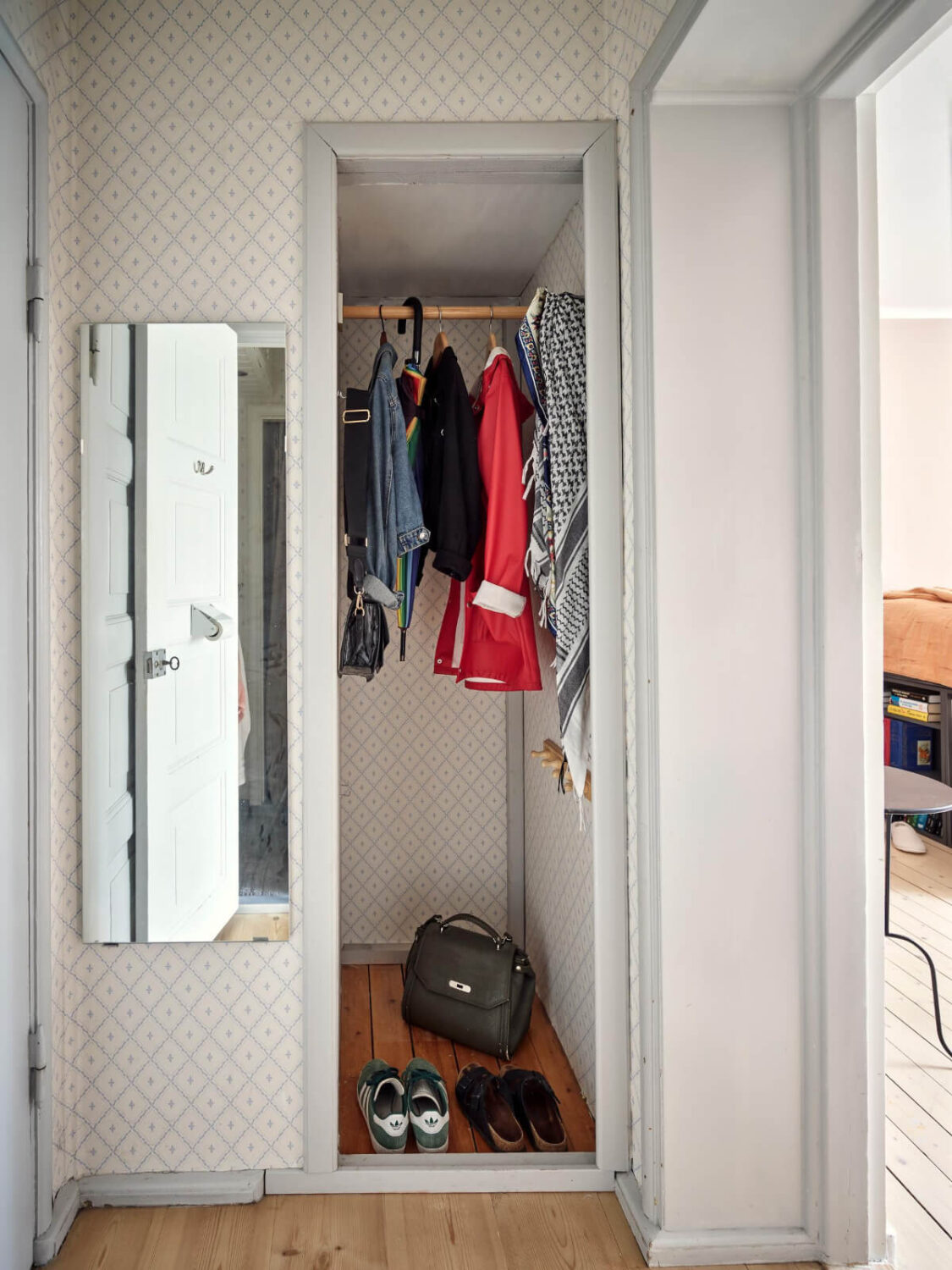 A Pink Ground Floor Studio Apartment with a Large Kitchen 15 hall built-in wardrobe
