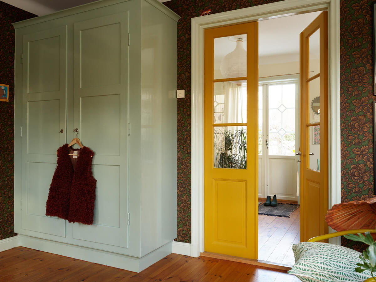 Colorful Interiors in a Wonderful Early 20th Century Swedish Villa 22 hall mint green wardrobe