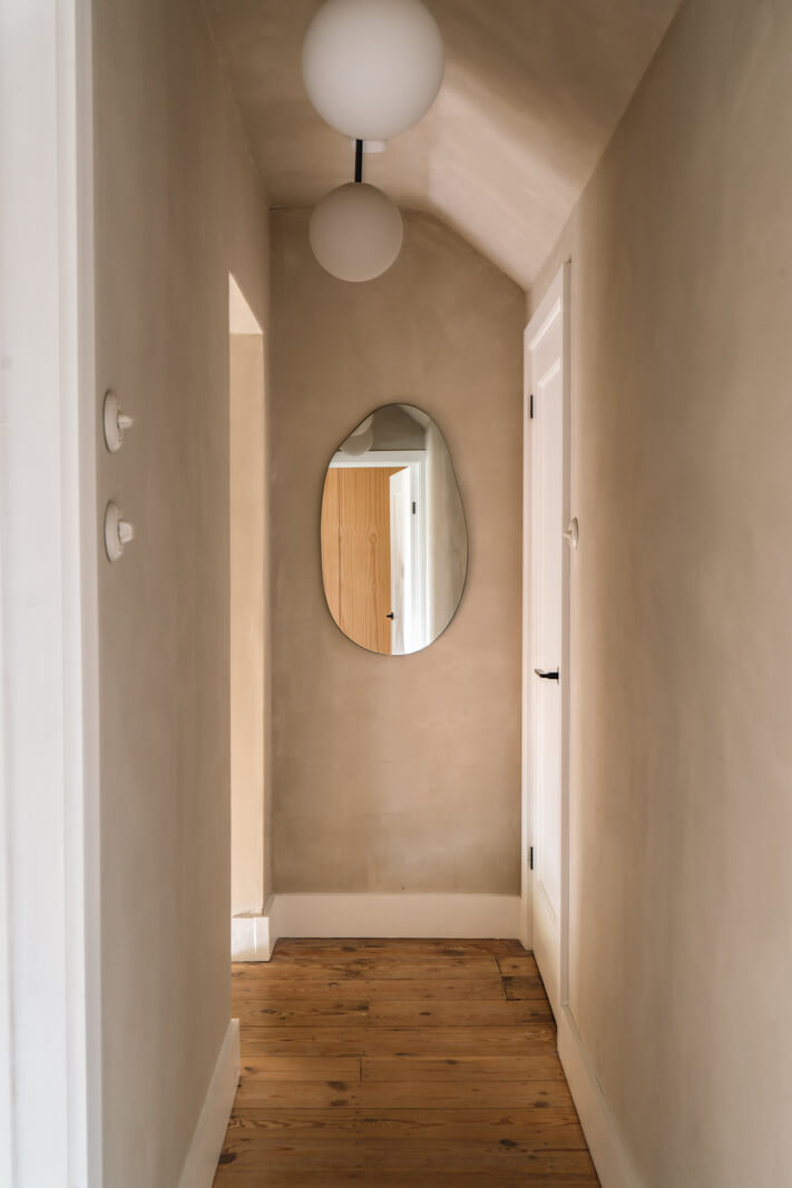 Contemporary Interiors in a Georgian Duplex Apartment in London 14 hall plaster walls wooden floor