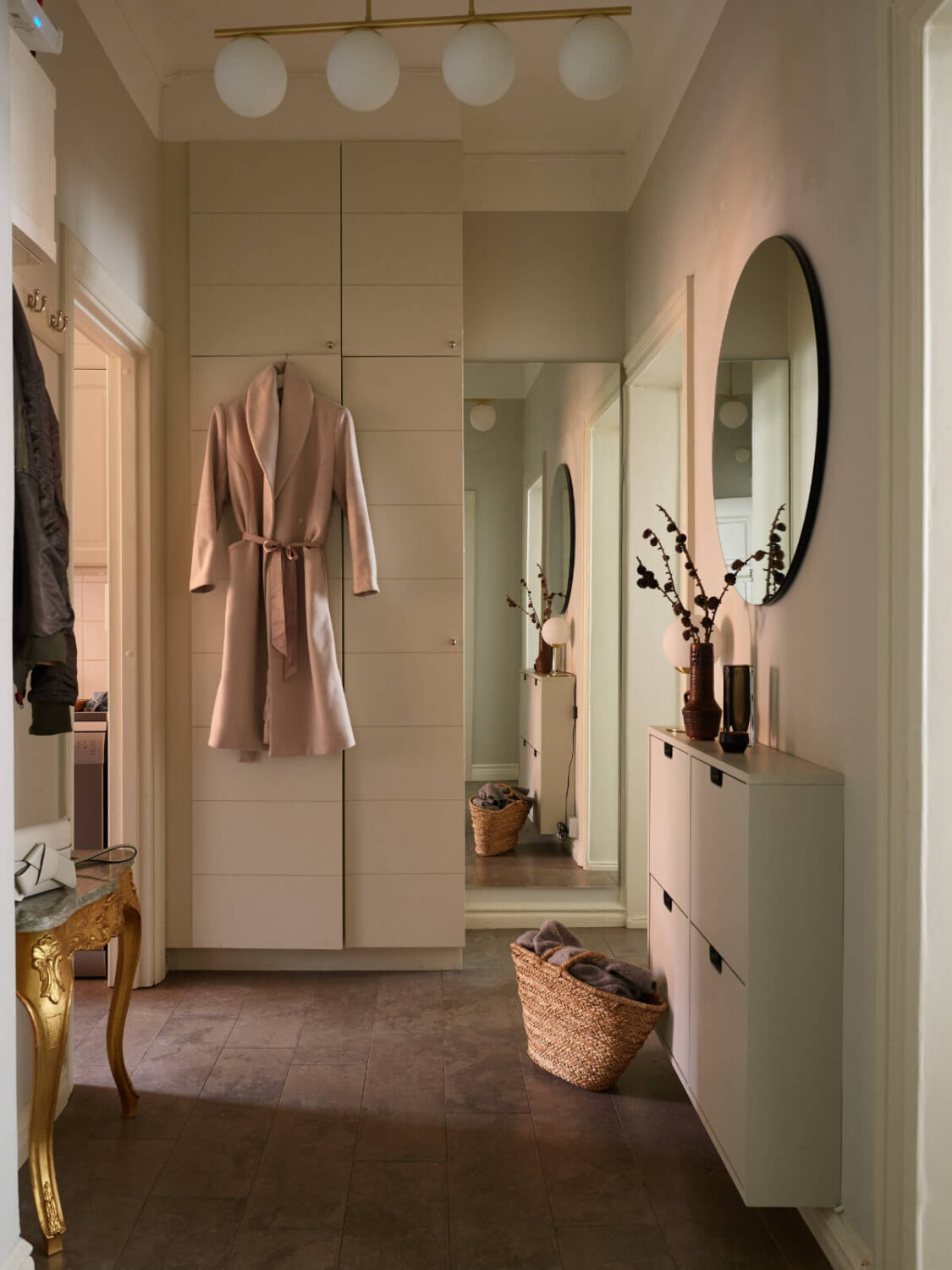 A Calm Gray Color Palette in a Charming Stockholm Apartment 18 hall stone floor wardrobes A Calm Gray Color Palette in a Charming Stockholm Apartment