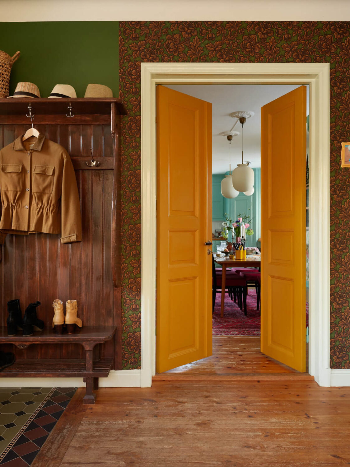 Colorful Interiors in a Wonderful Early 20th Century Swedish Villa 25 hall-yellow-doors