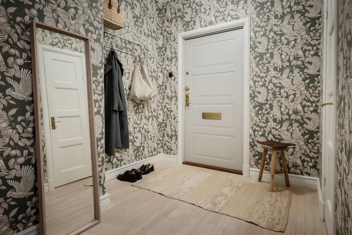 A Light Corner Apartment with an Open Flowing Floor Plan 35 hallway bird wallpaper A Light Corner Apartment with an Open Flowing Floor Plan