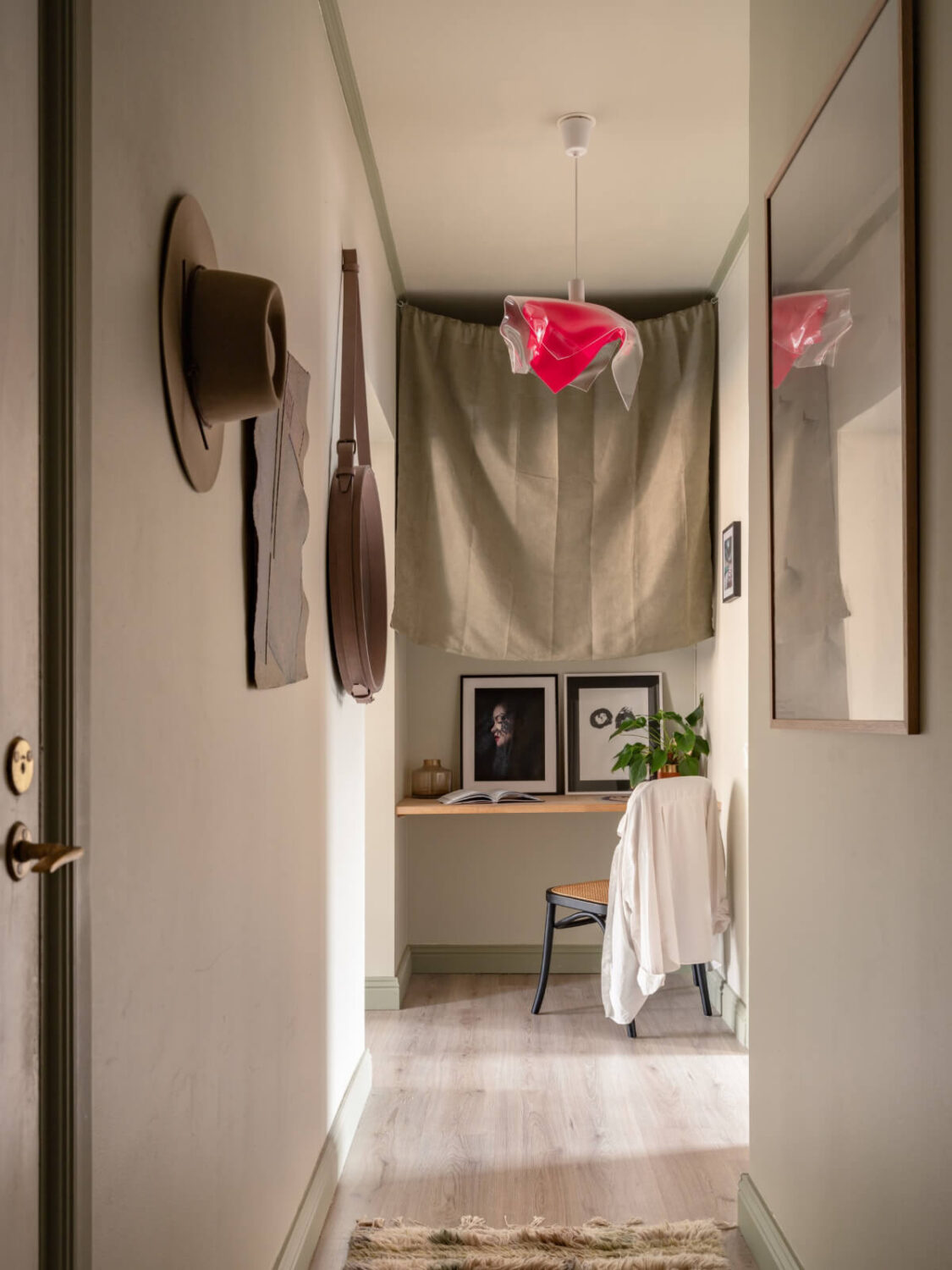 A Pink and Orange Bedroom in a Light Stockholm Apartment 24 hallway home office