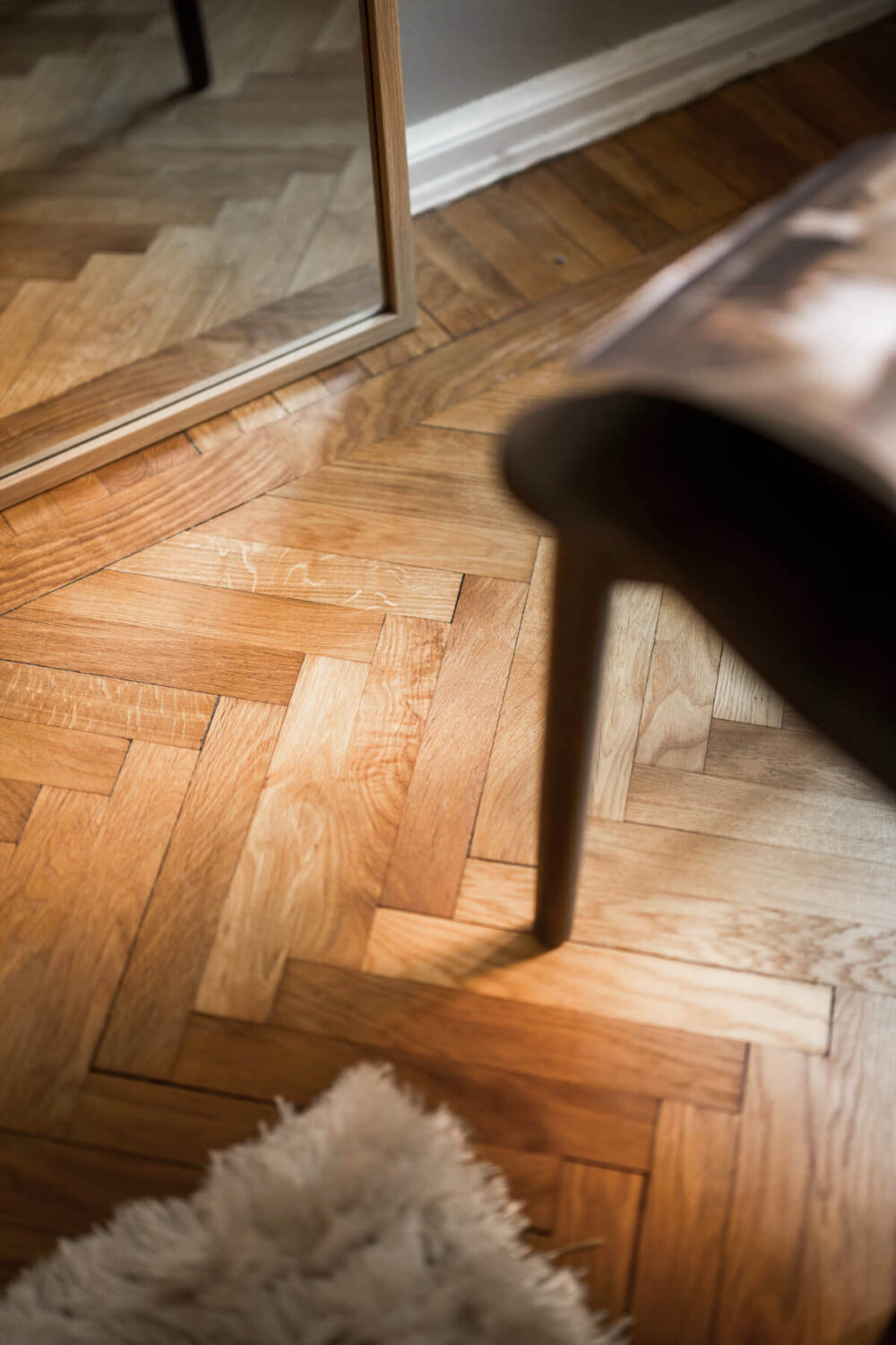 A Light Swedish Studio in an Early 20th Century Building 6 herringbone parquet floor