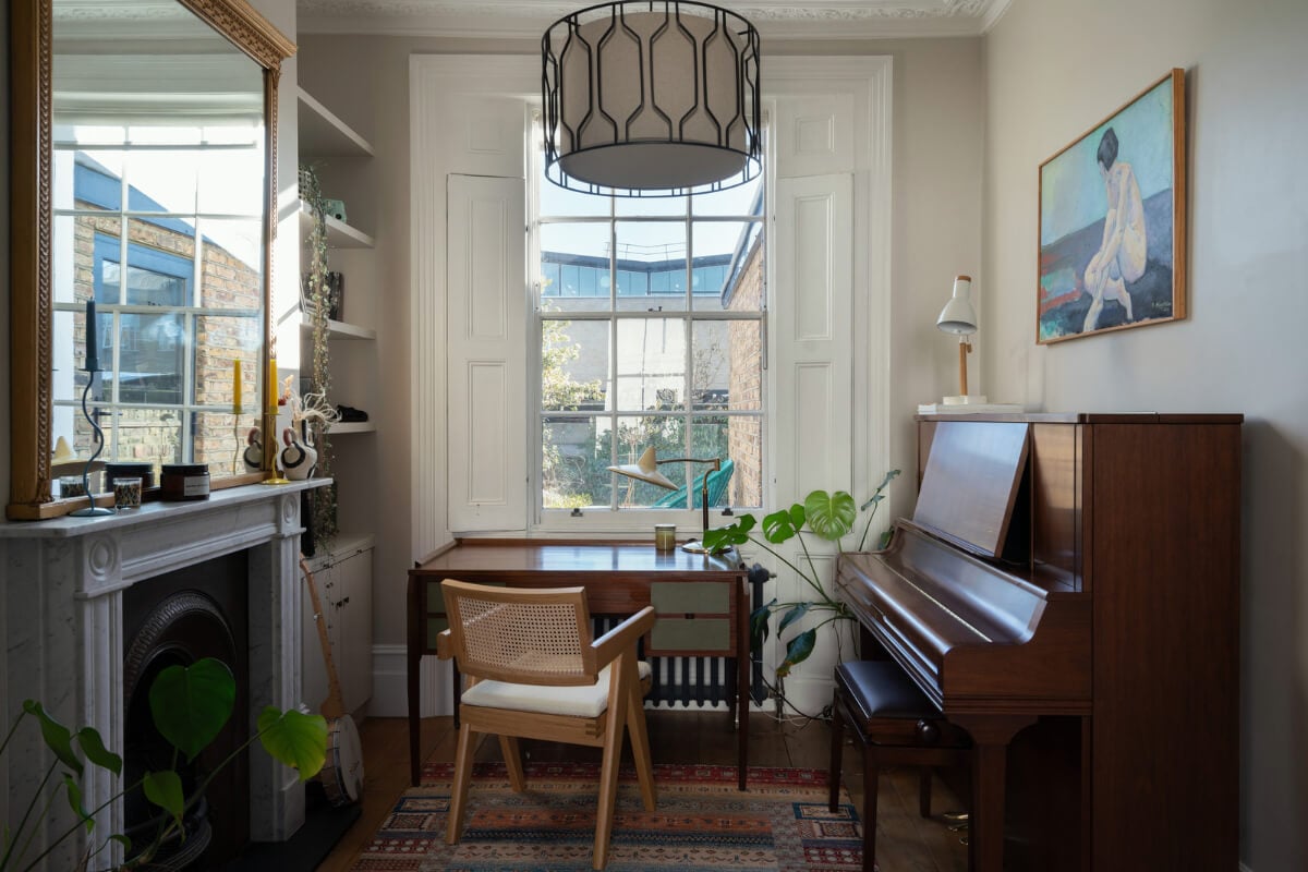 Contemporary Interiors and Preserved Details in an Early Victorian House 5 home office large sash window fireplace