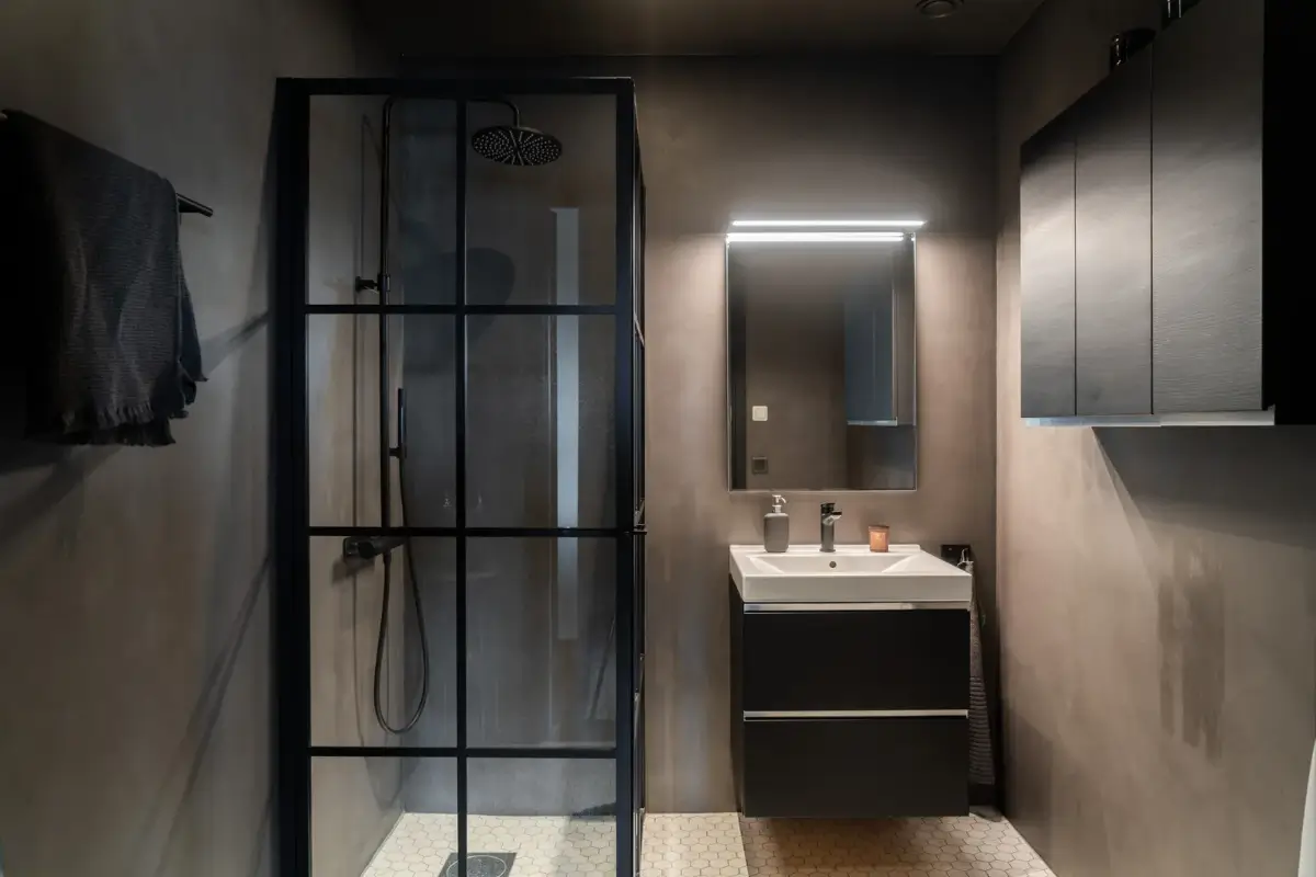 A Top Floor Swedish Apartment with a Huge Balcony 19 industrial style bathroom