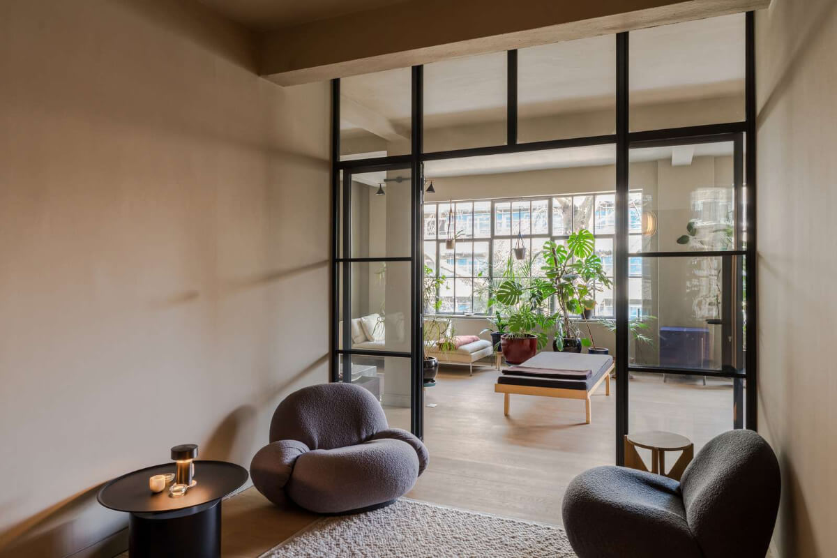 Soft-Colored Contemporary Interiors in a Warehouse Apartment 16 inner hall industrial glass wall