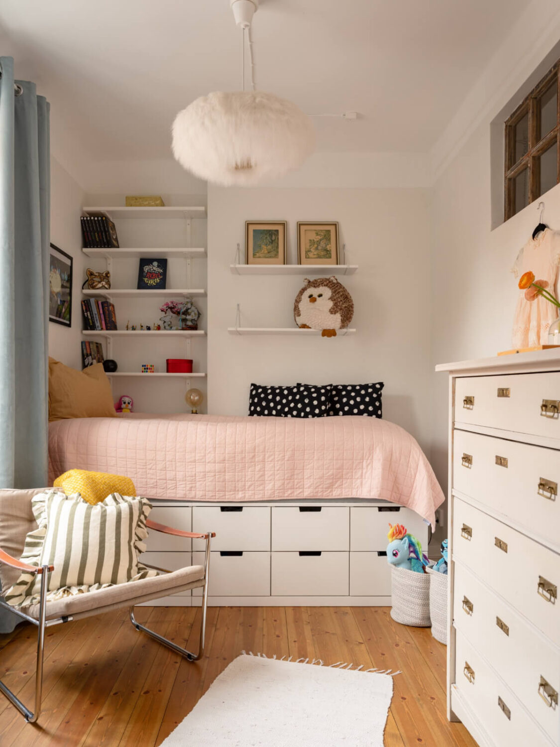 A Light Corner Apartment with a Pale Yellow Kitchen 21 kids bedroom raised storage bed