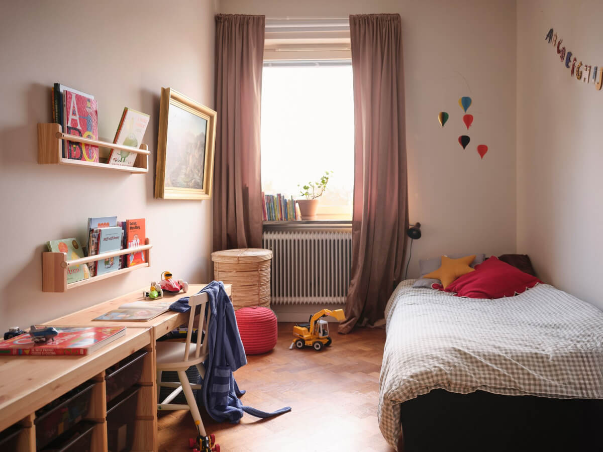 A Light Corner Apartment with Yellow Color Accents 22 kids bedroom wooden desk