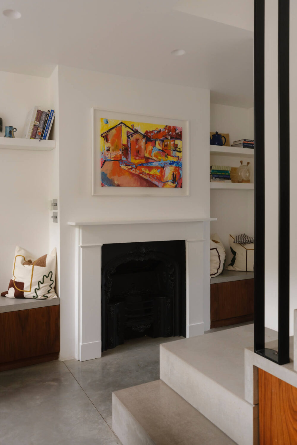 Five-Meter Glazed Garden Doors in an Expanded London Home 12 kitchen fireplace flanked by benches