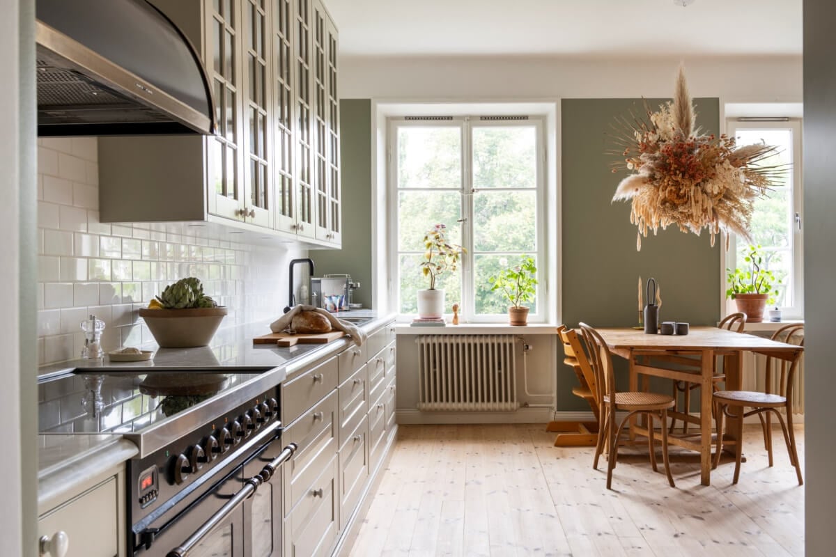 A Light Swedish Apartment with a Green Living Room 5 kitchen green open plan living space