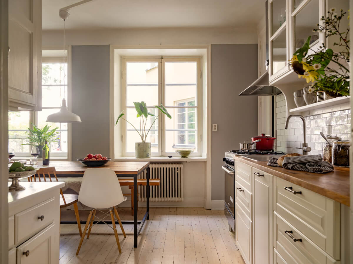 A Charming One-Bedroom Apartment in a 1920s Building 14 kitchen large wood and steel dining table