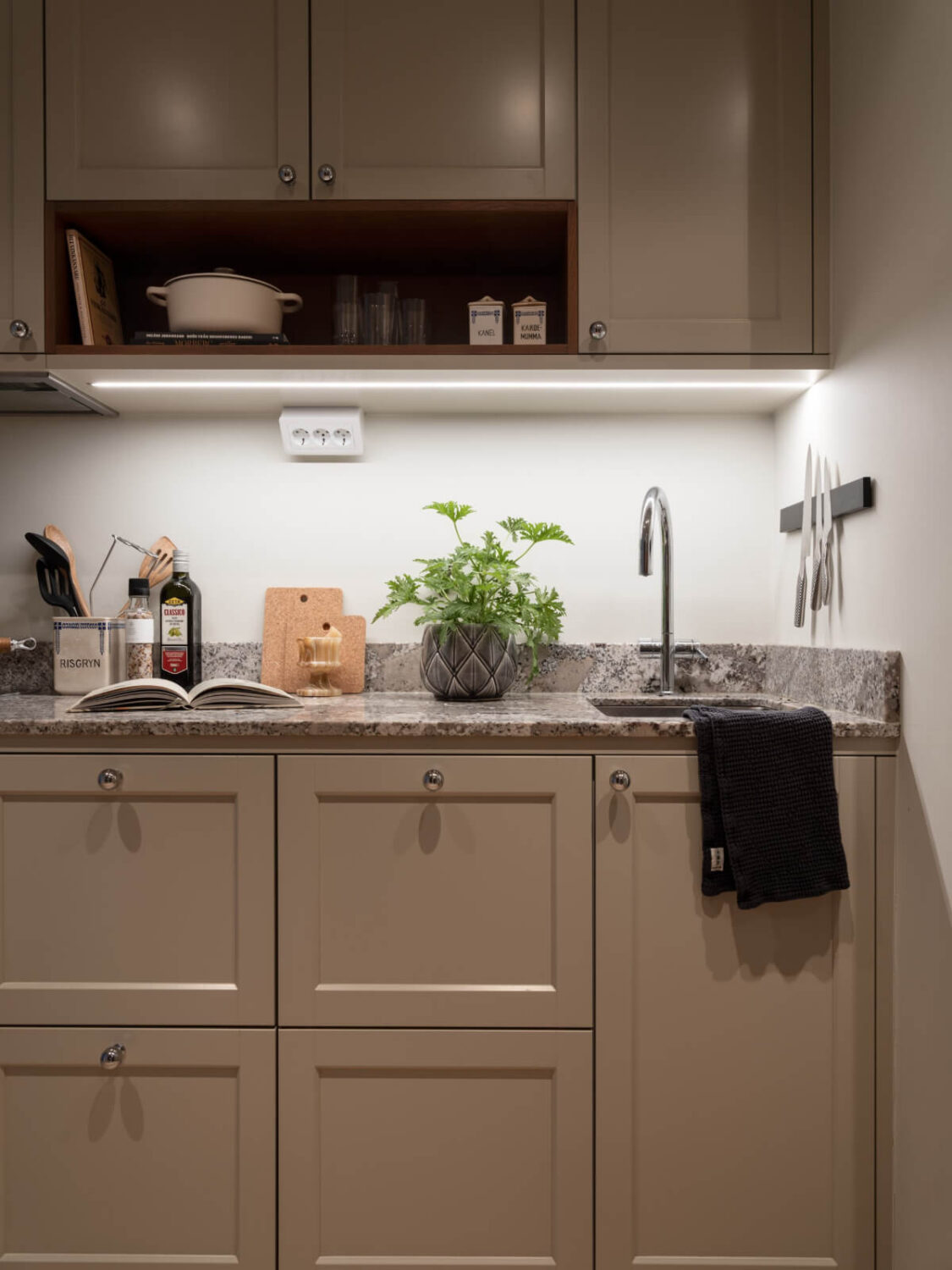 A Charming One-Bedroom Apartment in Södermalm 15 kitchen open cabinet