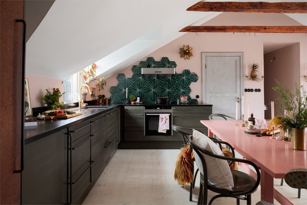 A Colorful Family Attic Apartment in Stockholm 18 kitchen pink walls green tiles