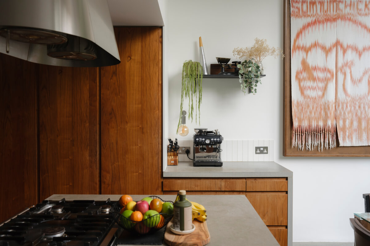 Five-Meter Glazed Garden Doors in an Expanded London Home 9 kitchen warm wooden cupboards concrete worktop