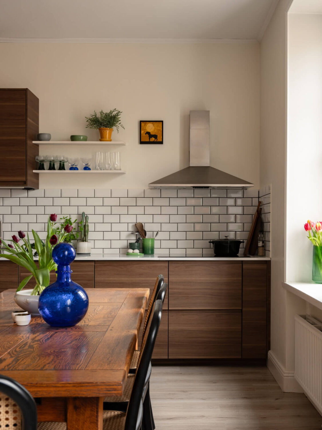 A Pink and Orange Bedroom in a Light Stockholm Apartment 13 kitchen white tiles