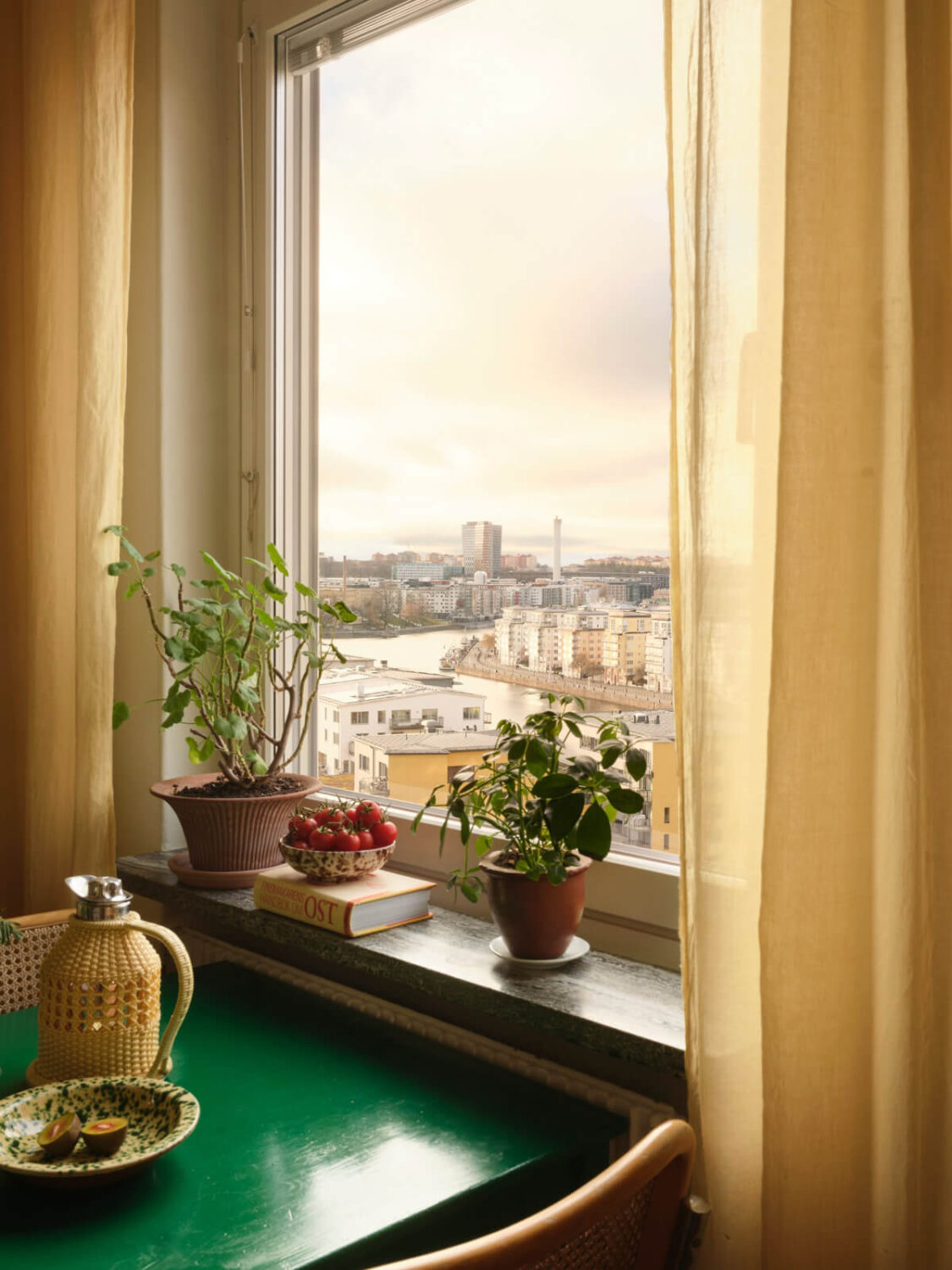 A Light Corner Apartment with Yellow Color Accents 16 kitchen window view