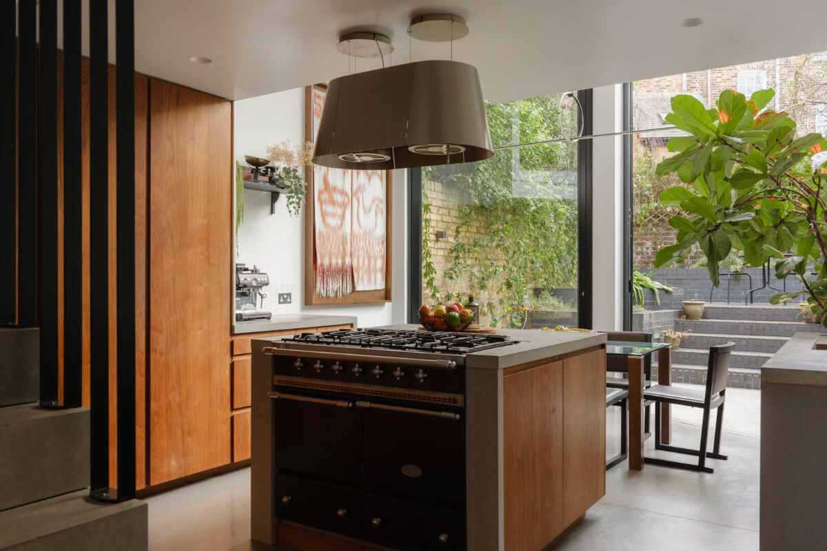 Five-Meter Glazed Garden Doors in an Expanded London Home 1 kitchen with island and large glass doors to garden