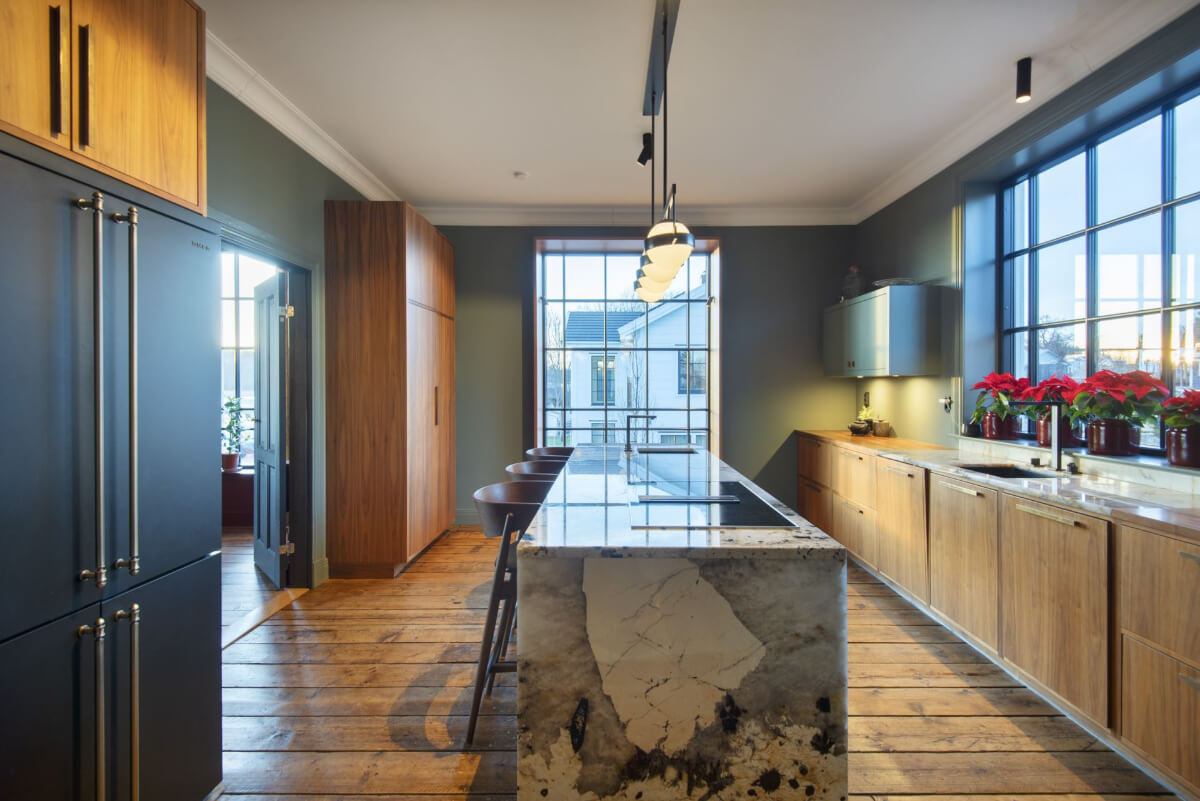 English Manor Style Interiors in a New Swedish Home with Lake Views 12 kitchen with large island