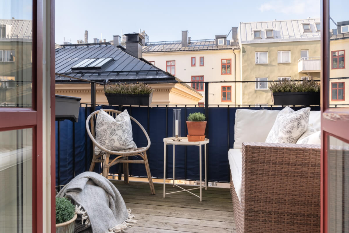 A Small Apartment Decorated in a Light Gray & White Color Palette 16 large balcony