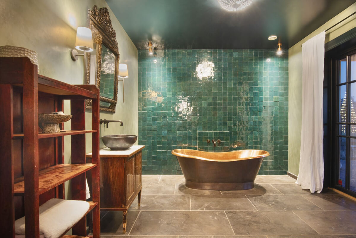 English Manor Style Interiors in a New Swedish Home with Lake Views 25 large bathroom green tiles copper bath