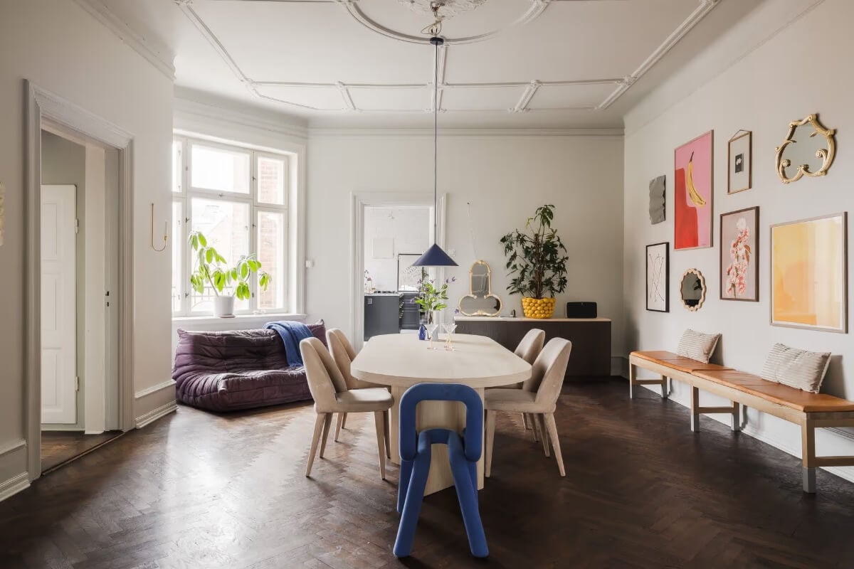 Grand Rooms and Period Features in a Malmö Apartment 8 large dining room colorful decor and furniture