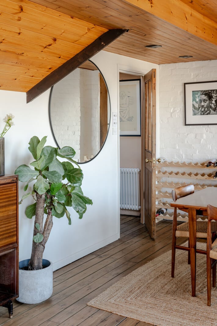 A Light Duplex Apartment in an Arts and Crafts Building 8 large round mirror