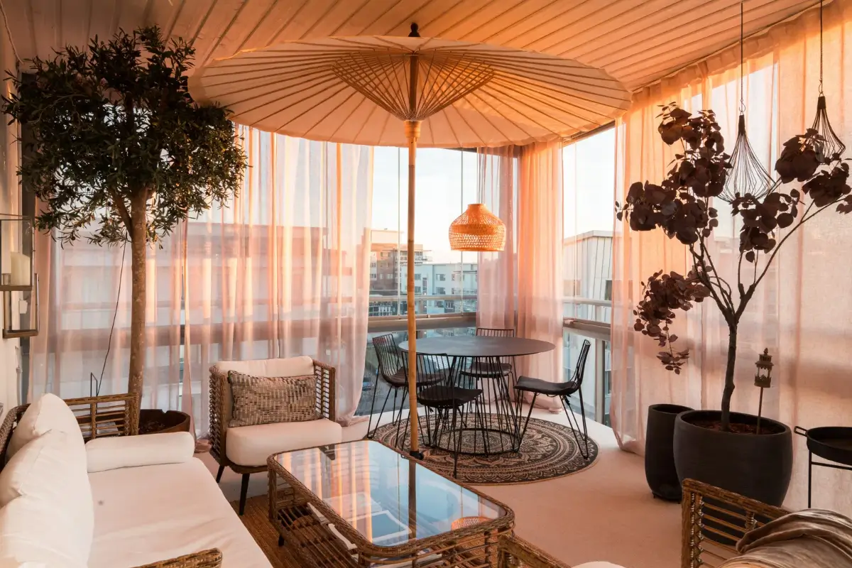 A Top Floor Swedish Apartment with a Huge Balcony 24 large terrace with curtains