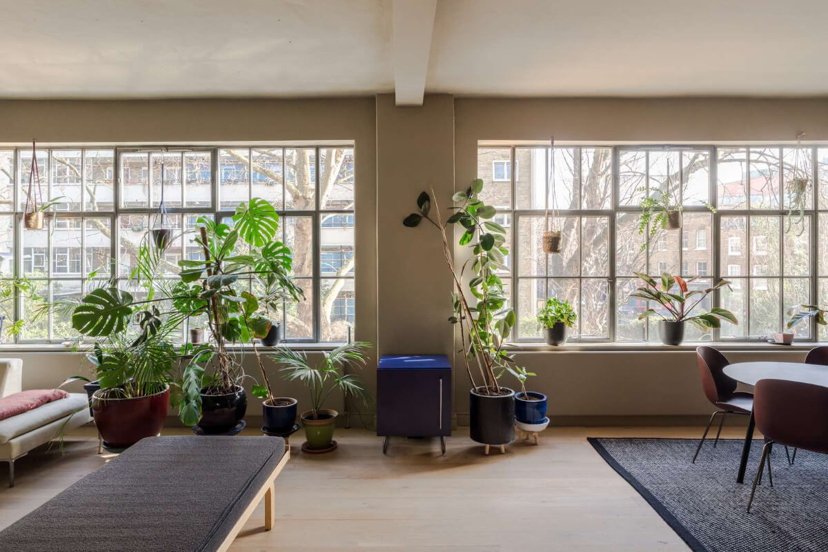 Soft-Colored Contemporary Interiors in a Warehouse Apartment 8 large warehouse windows
