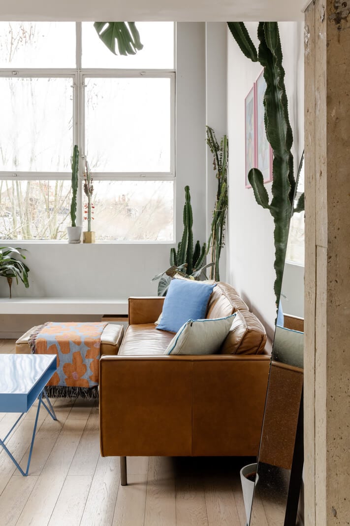 A Plant-Filled Loft Apartment in a Former Clothing Factory 8 leather sofa