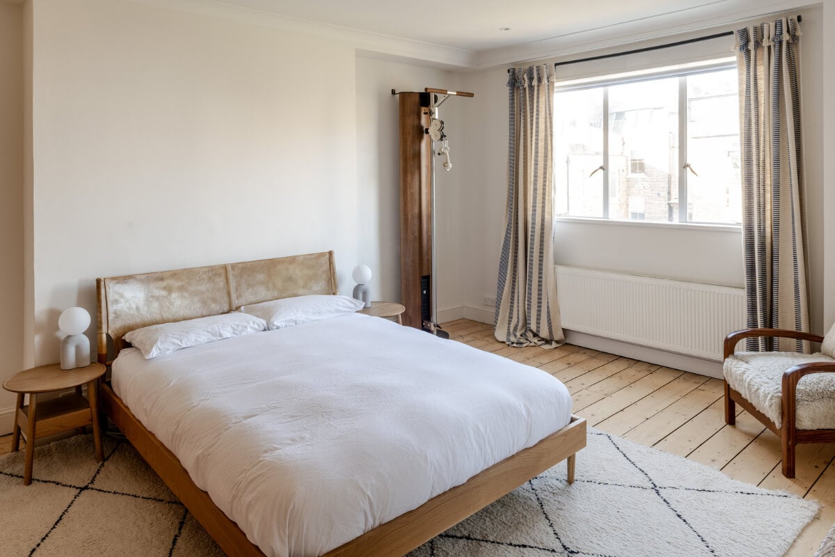 A Light Duplex Apartment in an Arts and Crafts Building 12 light bedroom wooden floorboards