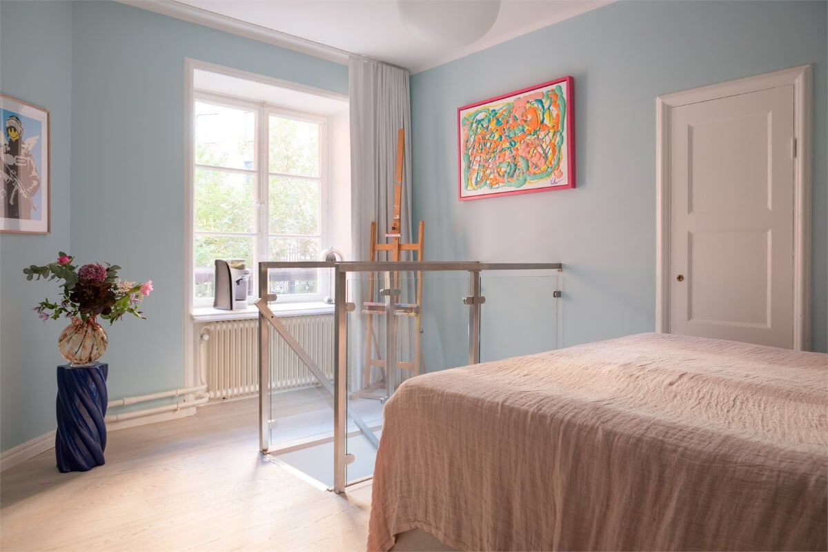 A Colorful Basement Duplex Apartment in Stockholm 15 light blue bedroom