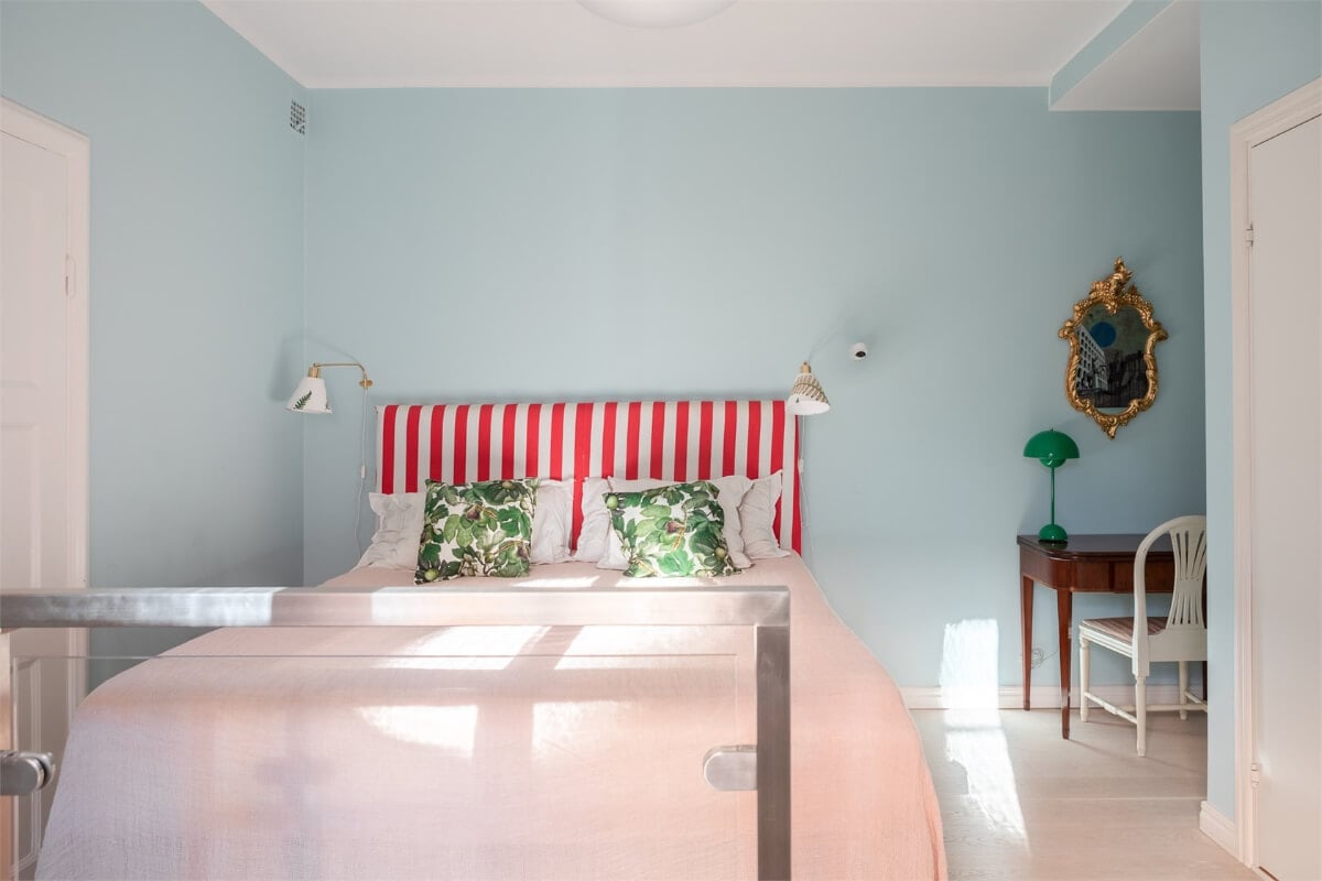 A Colorful Basement Duplex Apartment in Stockholm 17 light blue walls bedroom with desk
