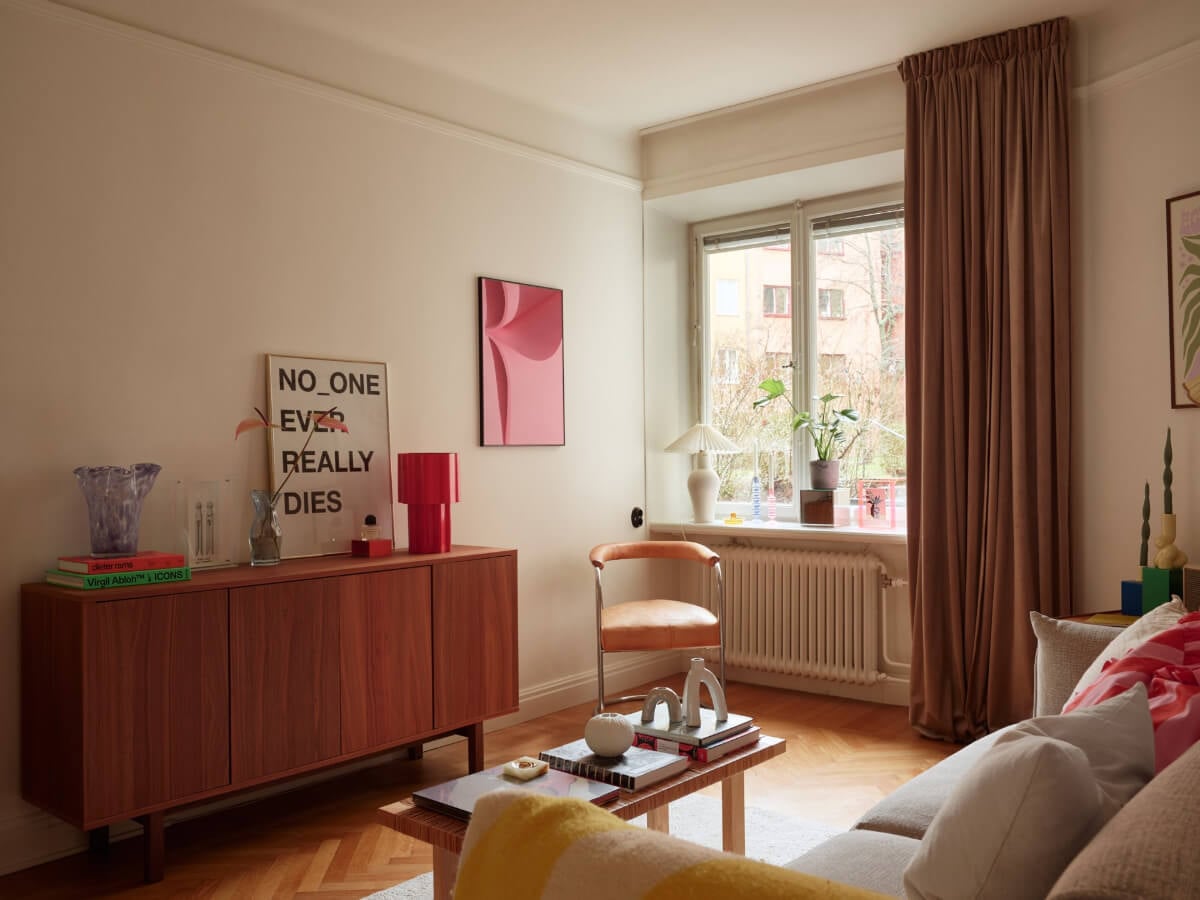 A Charming Small Apartment with a Fresh White Kitchen 1 light colored living room parquet floor