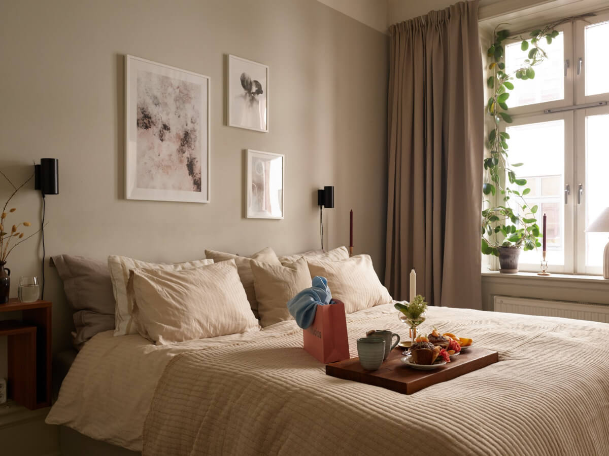 A Calm Gray Color Palette in a Charming Stockholm Apartment 7 light gray bedroom