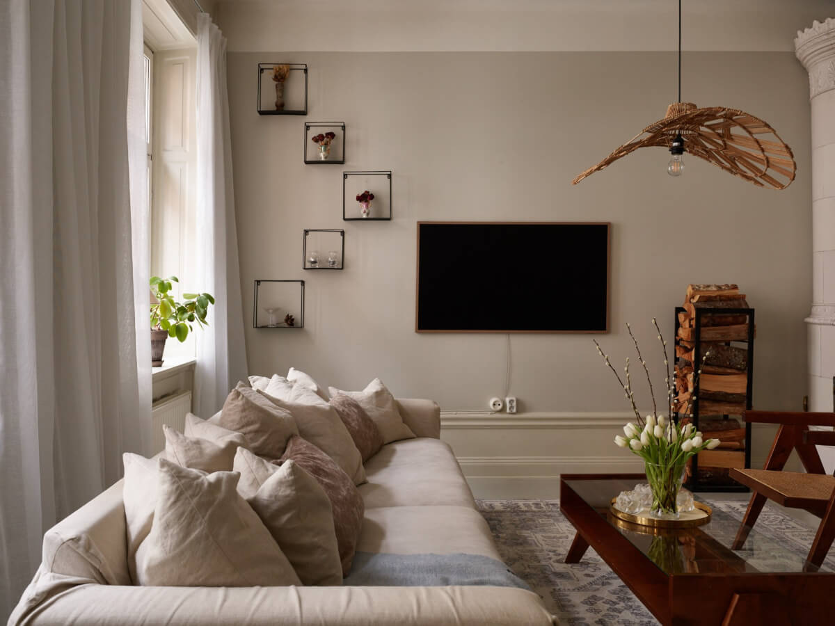 A Calm Gray Color Palette in a Charming Stockholm Apartment 3 light gray living room