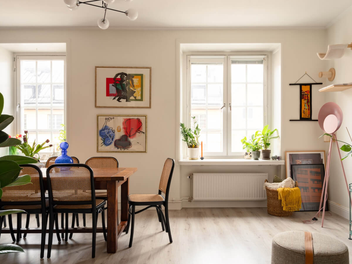 A Pink and Orange Bedroom in a Light Stockholm Apartment 9 light living room large dining table